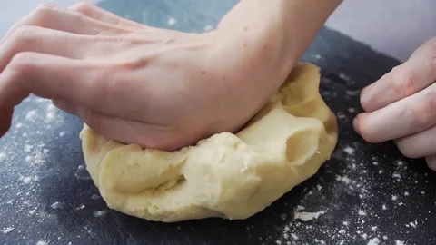 The cook makes dough for pie, making the cake, homemade backing Stock Footage 74053308