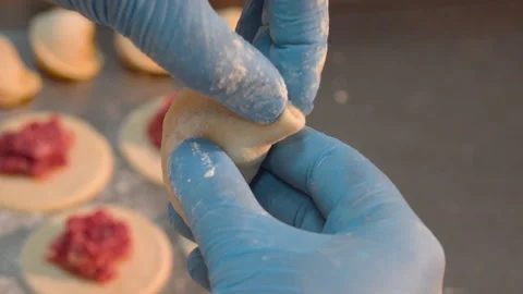 The cook makes dumplings Stock Footage 158020667