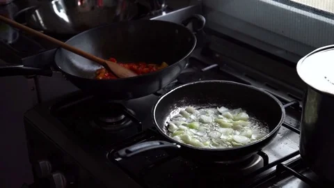 A cook makes a fried onion to prepare the sauce. About nutrition, cooking, sauce Stock Footage 71501072