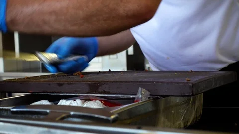 The cook makes meat rolls. Stock Footage 93435095