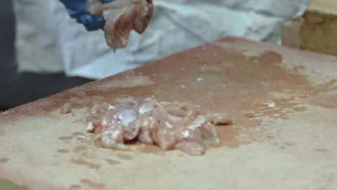 Cook makes pork chops by kitchen hammer Stock Footage 143782255