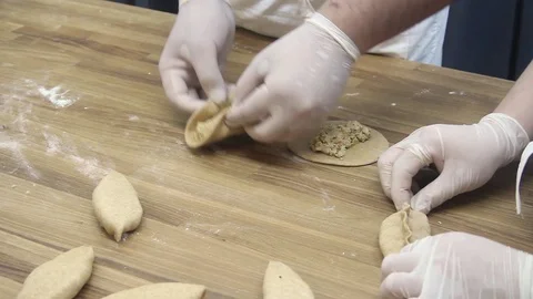 The cook makes small patties with meat Video stock 70004010
