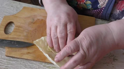 The cook makes stuffed cabbage rolls. healthy food concept Stock Footage 149317457