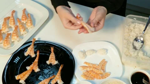 The cook makes sushi with shrimps Stock Footage 88495838