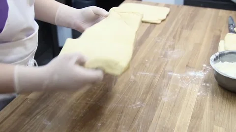 The cook makes the workpiece under the dough cake Stock Footage 69994137