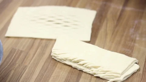 The cook makes the workpiece under the dough cake Video stock 70004464