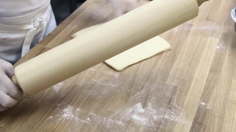 The cook makes the workpiece under the dough cake Video stock 70004552