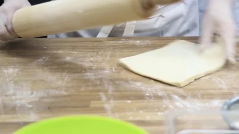 The cook makes the workpiece under the dough cake Stock Footage 70004747