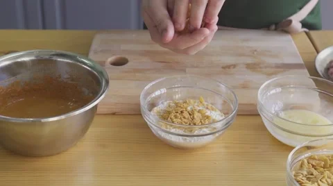 The cook is making marinade for kitchen legs Stock Footage 57606664