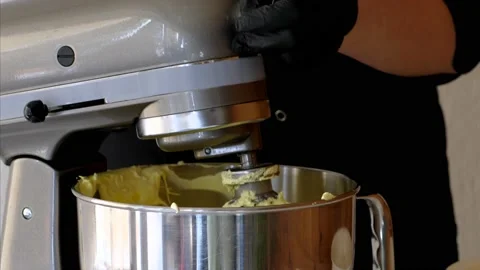 The cook is making yellow creme in professional blender for making dessert Stock Footage 134451483