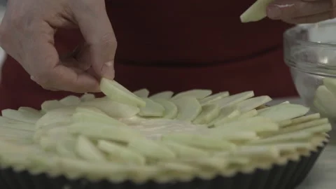 Cook Man Baker Putting Apple Pieces on Creamy Pie Video stock 160978004