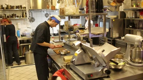 Cook man, chopped walnuts Stock Footage 48642389