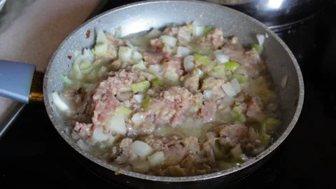 Cook minced meat in a pan Stock Footage 119159024