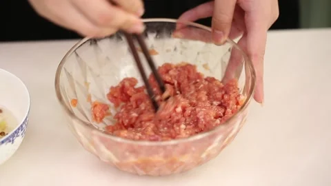 Cook mixed meat stuffing and pork stuffing (5) Stock Footage 202162903