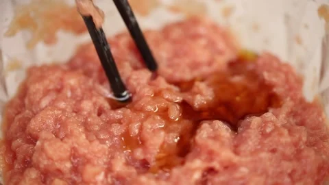 Cook mixed meat stuffing and pork stuffing (2) Stock Footage 202163404