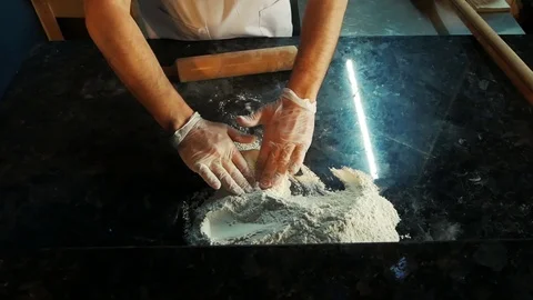 The cook mixes the dough Stock Footage 108205810