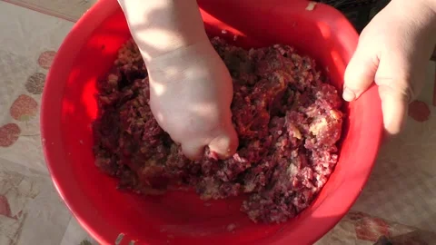 The cook mixes the minced meat Stock Footage 164187749