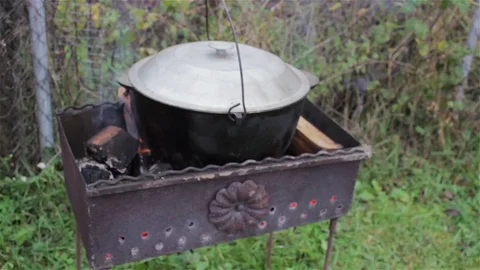 Cook on the nature of boilers Stock Footage 83273946