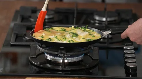 Cook an omelet Stock Footage 183593127
