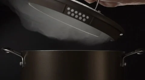 Cook open lid on steaming pot Stock Footage 62289163