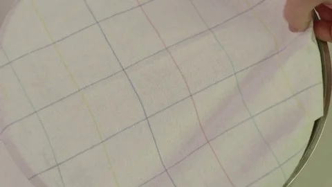 The cook opens the lid of the pan and takes the pilaf for tasting Stock Footage 76246740