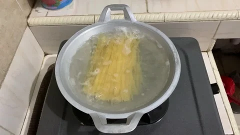 Cook pasta in boiling water Stock Footage 282894902