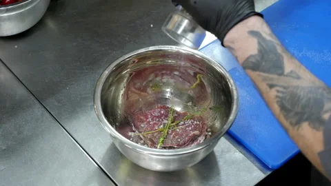 The Cook Peppers the Meat Stock Footage 132167184