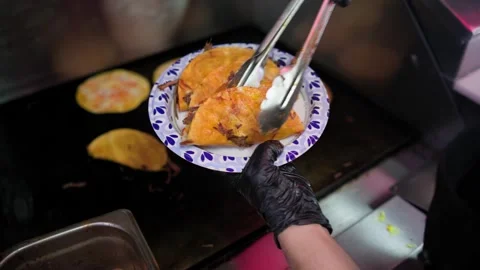 Cook Plates Fresh Quesabirria Tacos for Serving Stock Footage 342786495