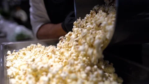 Cook pours Popcorn Video stock 108110213