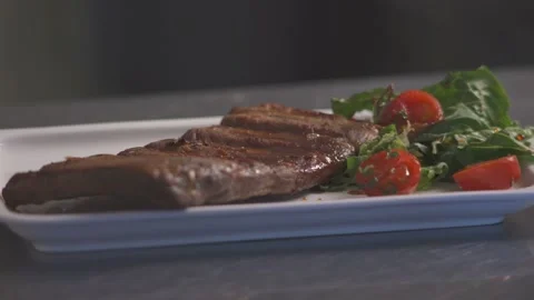 The Cook pours roasts with vegetables red sauce. Stock Footage 89058602