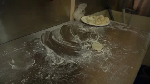The Cook Prepare and rolling out Open Dough for Cooking Stock Footage 252957126