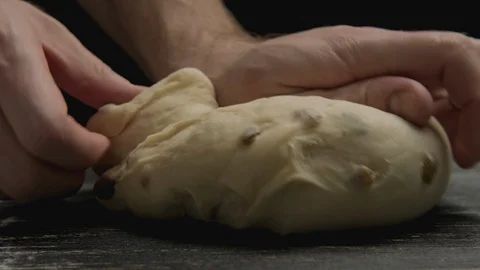 Cook prepare pie or buns. Male hands kneading dough on wooden table. Close-up 스톡 동영상 129606591