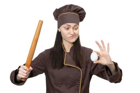 Cook prepared to break an egg Stock Photos