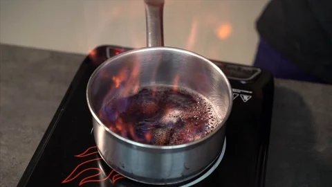 Cook prepares beetroot appetizer. Chef prepares a sauce on white wine Stock Footage 126446807