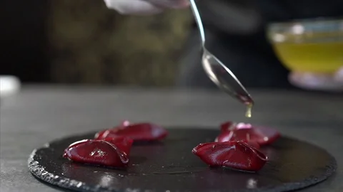 Cook prepares beetroot appetizer. Cook decorates beetroot appetizer Stock Footage 126447276
