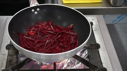 Cook Prepares Beets In A Frying Pan 库存影片 105876905