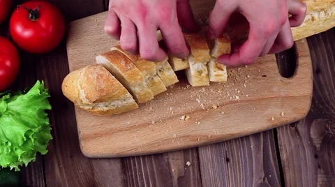 Cook Prepares Canapes. he Was Disintegrating Pieces of Baguette on the Board. 스톡 동영상 61882175