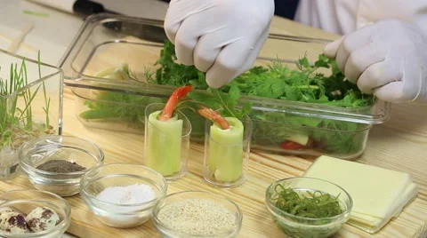 Cook prepares canapes in the kitchen Stock-Footage 62709299