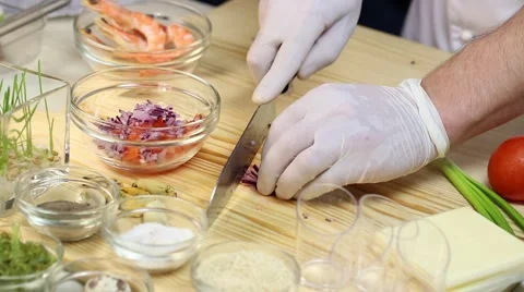 Cook prepares canapes in the kitchen Stock-Footage 62709382