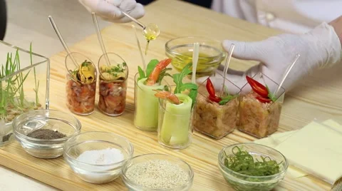 Cook prepares canapes in the kitchen Stock Footage 62709663