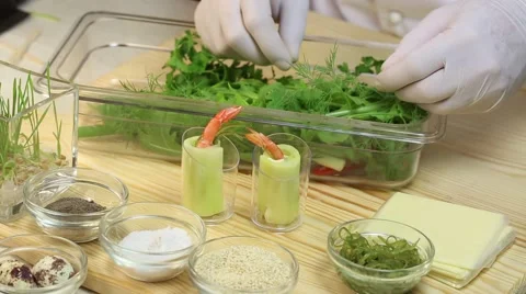 Cook prepares canapes in the kitchen Stock Footage 62709667