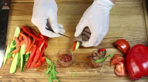 Cook prepares canapes in the kitchen Stock Footage 64052400