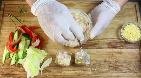 Cook prepares canapes in the kitchen Stock Footage 64052790