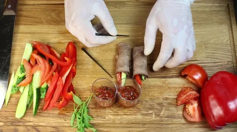 Cook prepares canapes in the kitchen Stock-Footage 64053034