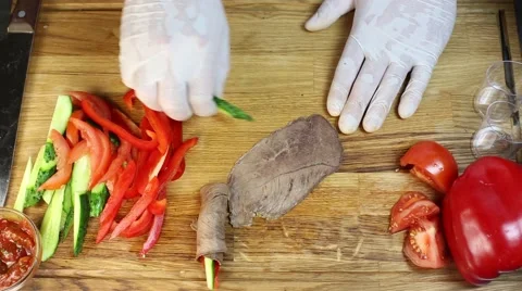 Cook prepares canapes in the kitchen Stock-Footage 64053142