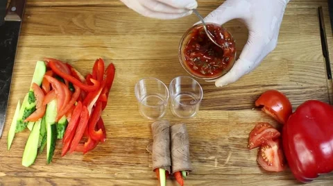 Cook prepares canapes in the kitchen Stock-Footage 64053160