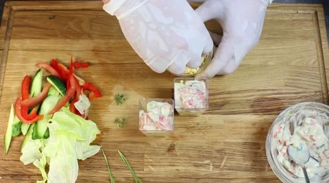 Cook prepares canapes in the kitchen Stock-Footage 64053174