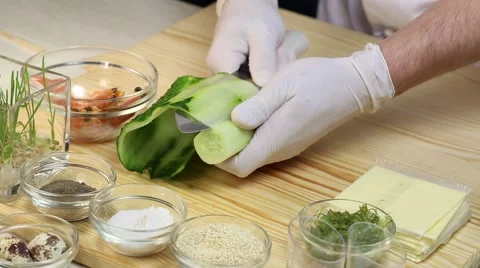 Cook prepares canapes in the kitchen at the restaurant Stock-Footage 62709219