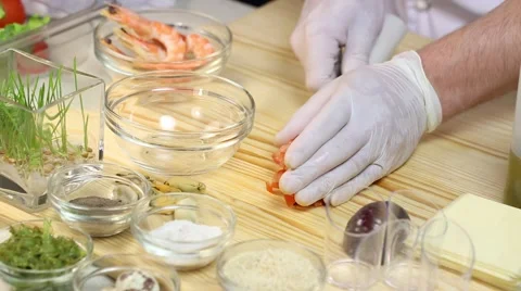 Cook prepares canapes in the kitchen at the restaurant Stock-Footage 62709226