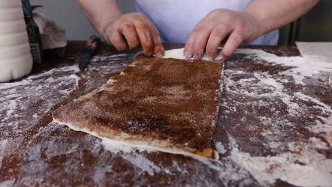 The cook prepares a cinnamon cake 스톡 동영상 135132819